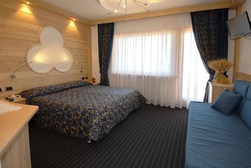 Hotel Flora Alpina Campitello di Fassa Esterno foto