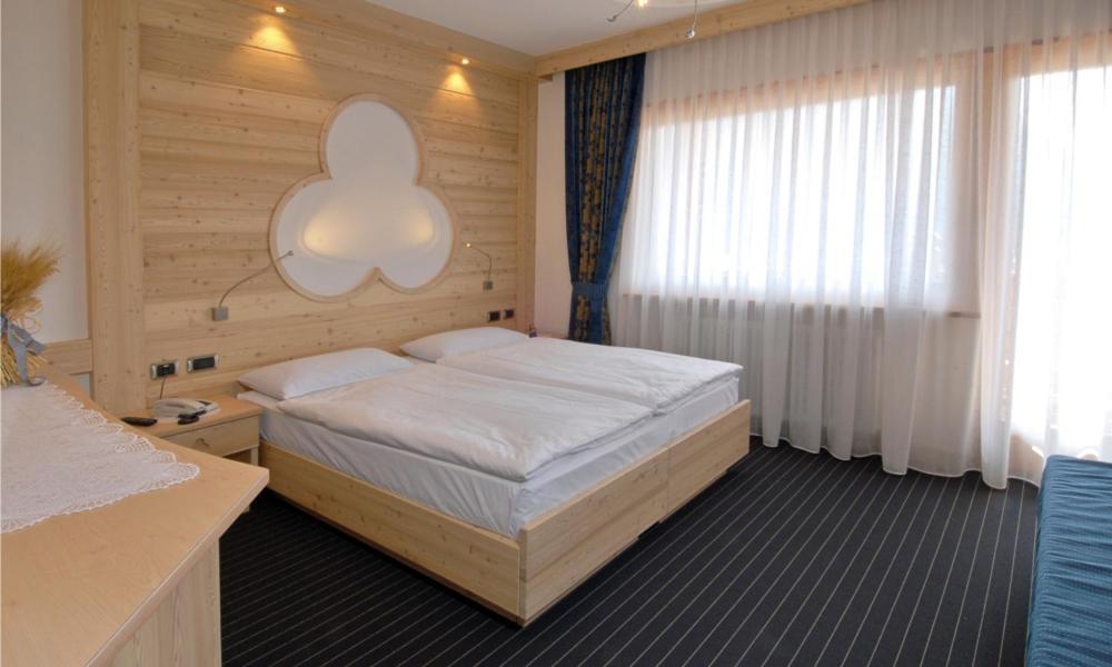 Hotel Flora Alpina Campitello di Fassa Esterno foto